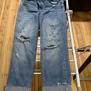 Blue Boyfriend Jeans with Ripped Knees and Frayed Hems